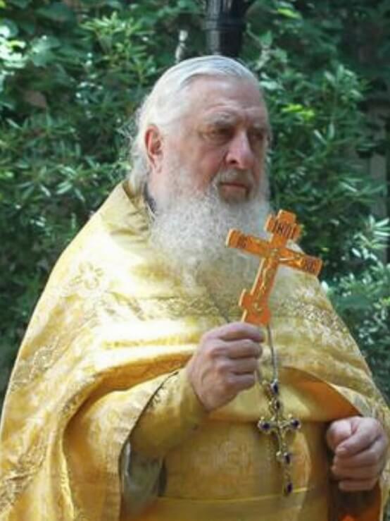 Father Andrei Semyanko with cross