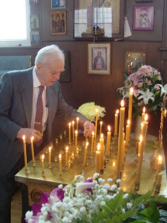 Parishioner with candles